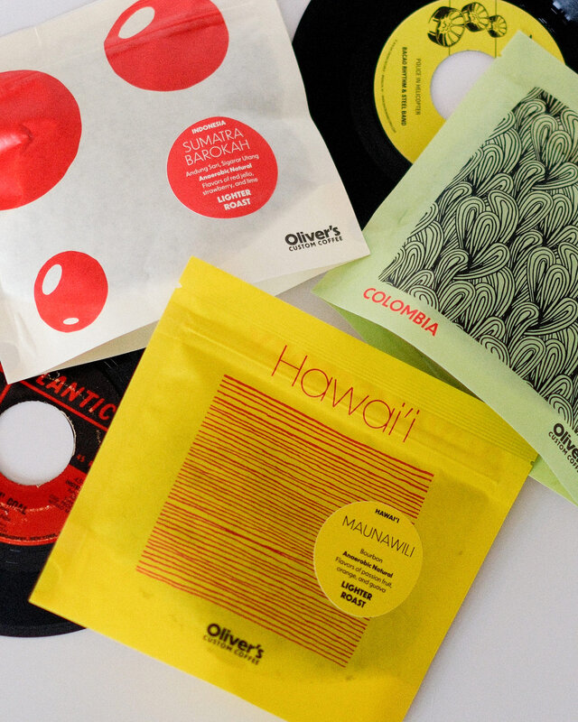 a trio of Oliver's bags with jazz albums