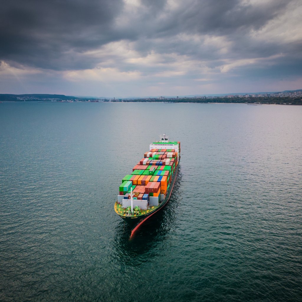 Aerial view of a loaded container ship at sea