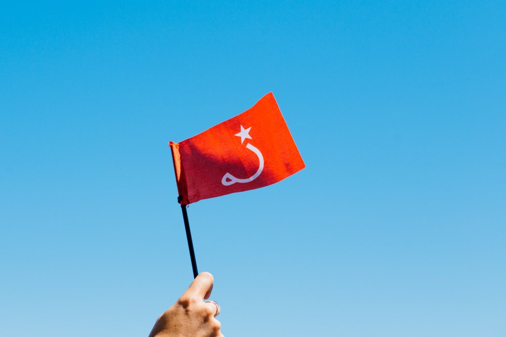 ritual flag waving in sky