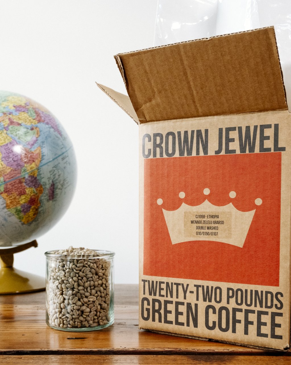 Royal Coffee crown jewel box featuring the new logo