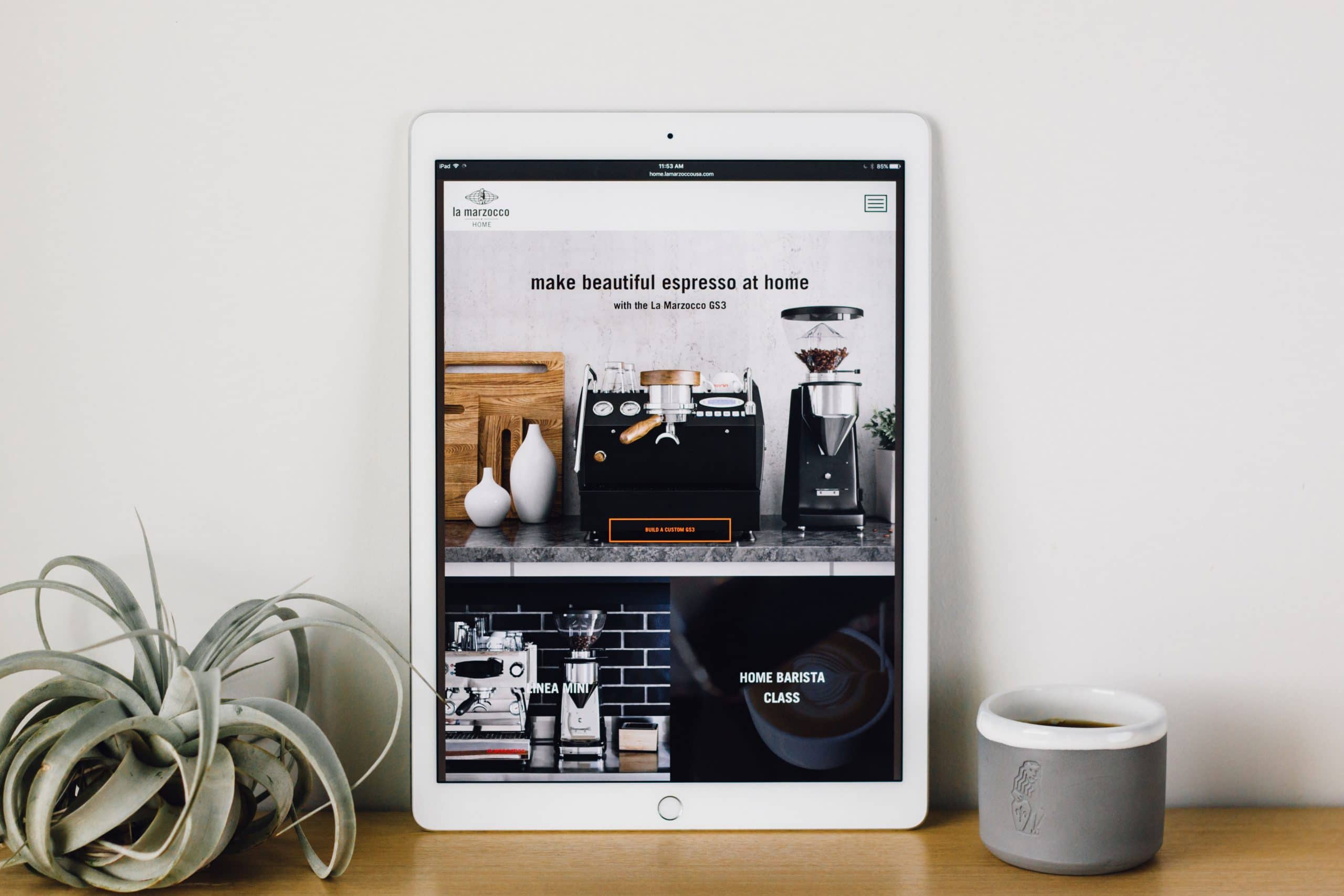 The redesigned home page of the La Marzocco Home shown on an iPad.