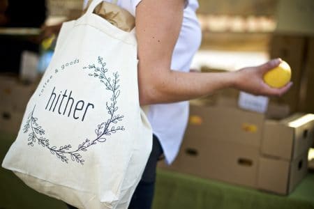 hither logo on a tote bag