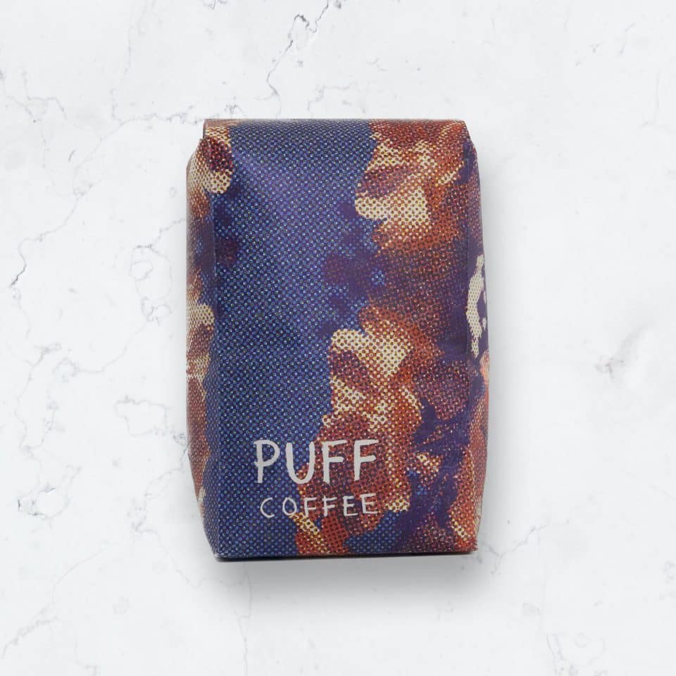 Puff Coffee bag on a marble background